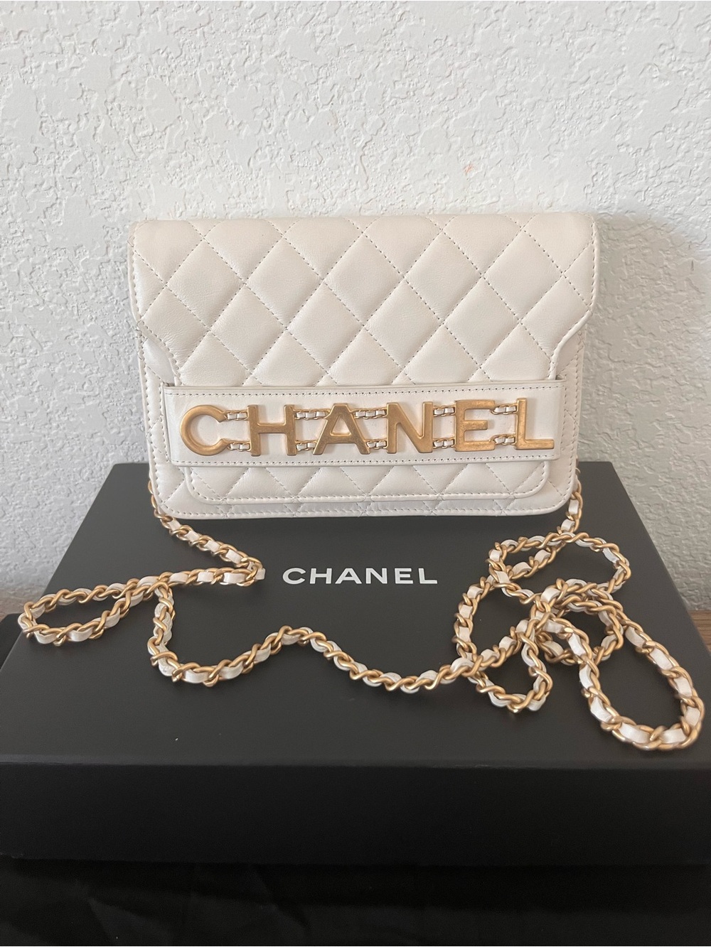 CHANEL Quilted Cream Leather WOC wallet on chain Gold